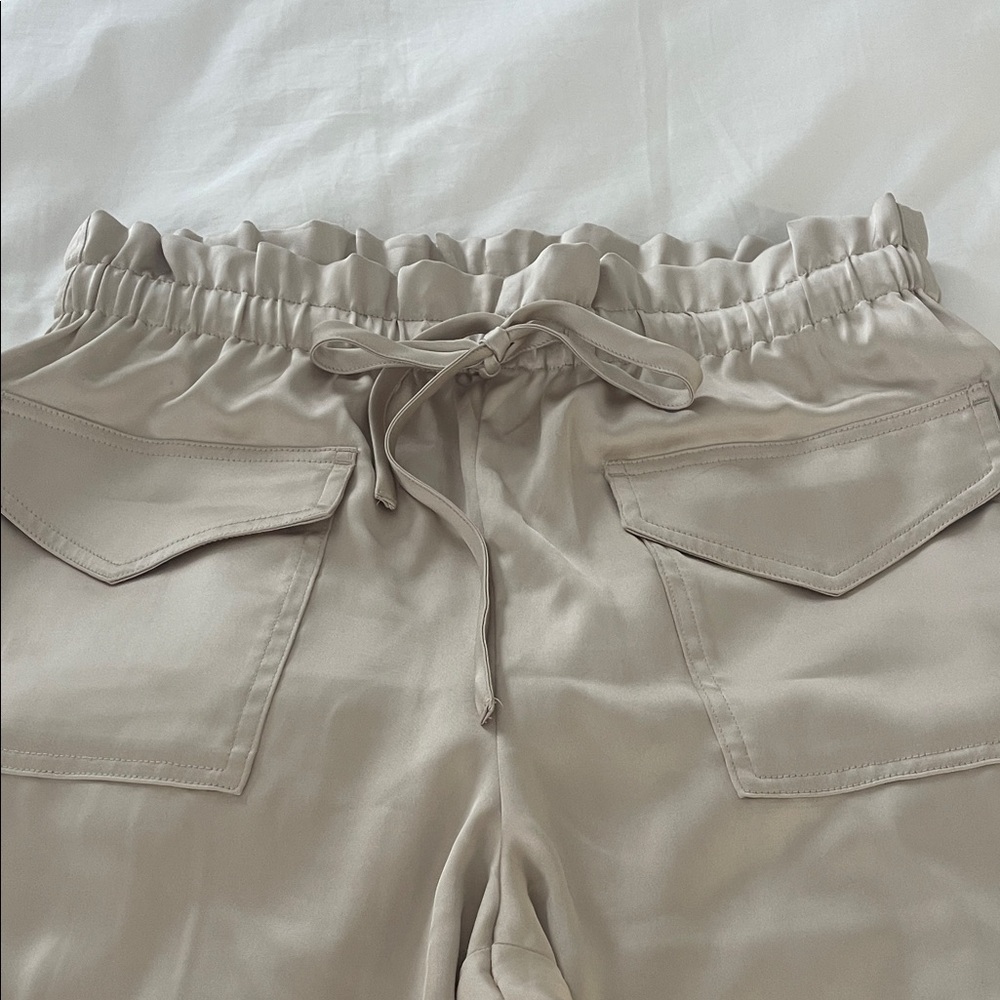 Silky gold/tan cargo pants. Size large.